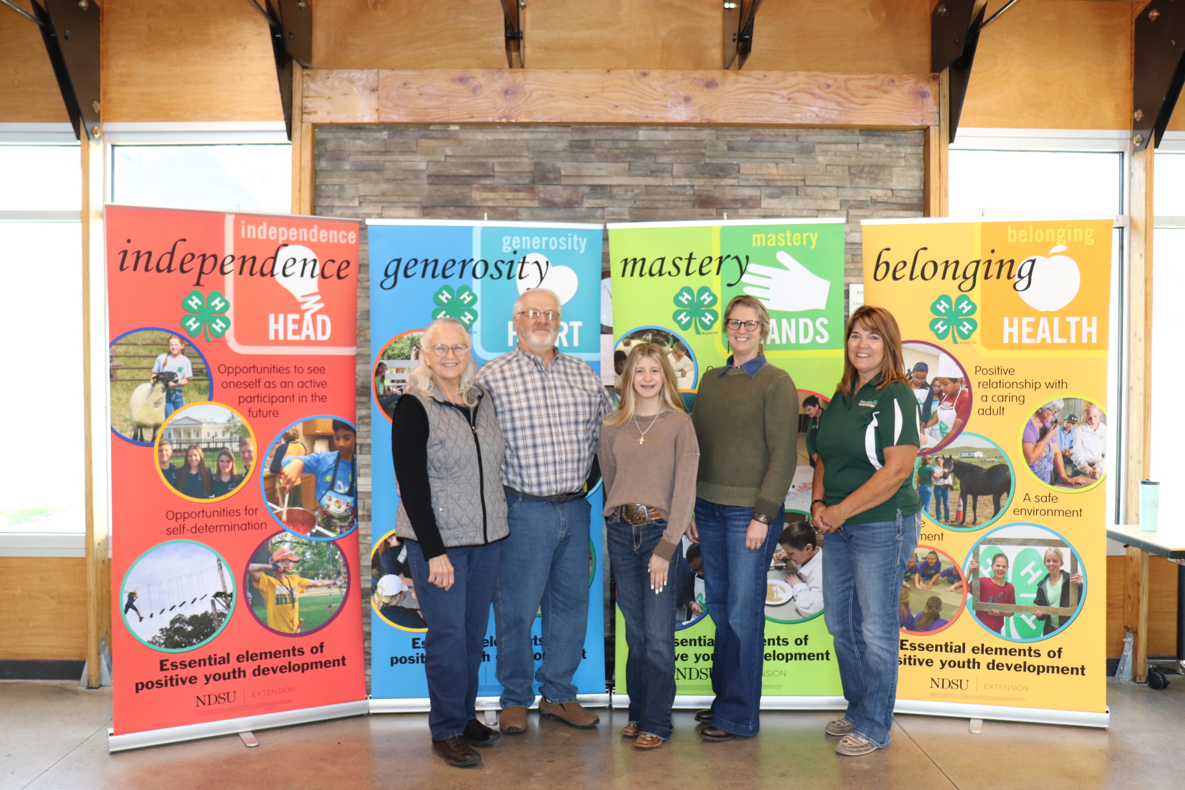 The Bopp family is recognized as a North Dakota 4-H Century Family. Pictured from left: Sherry Zirnhelt; Dan Zirnhelt; Mariah Bopp; Christine Bopp and Becky Peterson, North Dakota 4-H Foundation chair. (NDSU photo)