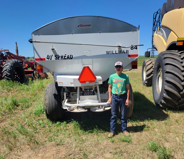 Lane Petrick of Grant County, North Dakota, placed first for properly installing a slow-moving vehicle sign on a Wilmar pull-type 40’ fertilizer spreader. (NDSU photo)