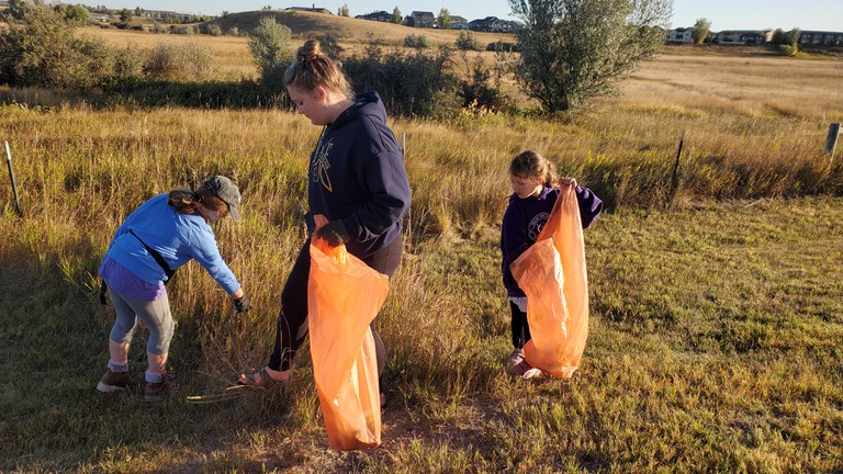 Members from the Clever Clovers 4-H Club in Williams County pick up trash for “Clean Williston,” a community service project for the Healthy North Dakota 4-H Club challenge. (NDSU photo)