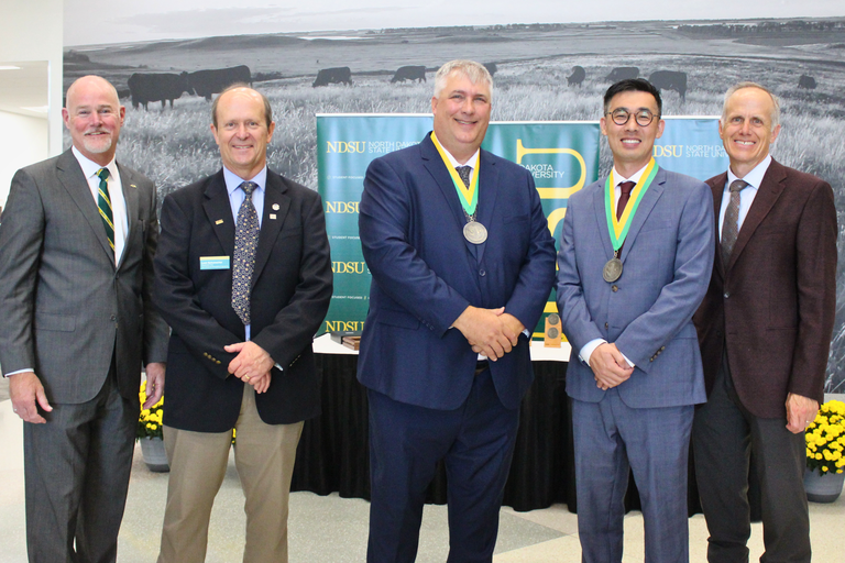 North Dakota State University, the NDSU Foundation, NDSU College of Agriculture, Food Systems, and Natural Resources, and NDSU College of Engineering celebrated the launch of the Peltier Institute for Advancement in Agricultural Technology with a medallion ceremony on Sept. 29, honoring new endowed faculty positions and student scholars. (Pictured L to R: Alan Kallmeyer, NDSU College of Engineering dean;  Leon Schumacher, Department of Agricultural and Biosystems Engineering chair; Matthew Olhoft, Endowed Professor of Practice for Advancement in Agricultural Technology; Xin (Rex) Sun, Peltier Institute for Advancement in Agricultural Technology endowed chair; Greg Lardy, Joe and Norma Peltier Vice President for Agriculture.)