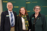 Sarah Lovas (center), former North Dakota State Board of Agricultural Research and Education chair, is honored with the 2026 Friend of Extension award by Greg Lardy (left), Joe and Norma Peltier Vice President for Agriculture at NDSU, and Lynette Flage (right), NDSU Extension associate director.  (NDSU photo)