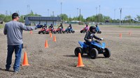A child participates in a North Dakota OHV Youth Safety Course certification training program held during an NDSU Extension Farm Safety Camp. (NDSU photo)