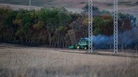 Combine fires are a serious threat during a dry harvest season. (photo by Jesse Orgaard)