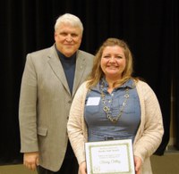 Stacey Ostby, right, receives the William J. and Angelyn A. Austin Excellence in Advising Award from David Buchanan, associate dean for academic programs. (NDSU photo)