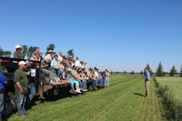 Visitors learn about issues and opportunities in organic agriculture during a field tour at the NDSU Carrington Research Extension Center. (NDSU photo)