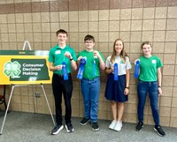 First Place Junior Team: Burleigh/Morton Counties Pictured left to right: Nathan Springer (Burleigh), William Doll (Burleigh), Rita Goettle (Morton) and Everly Boehm (Morton)