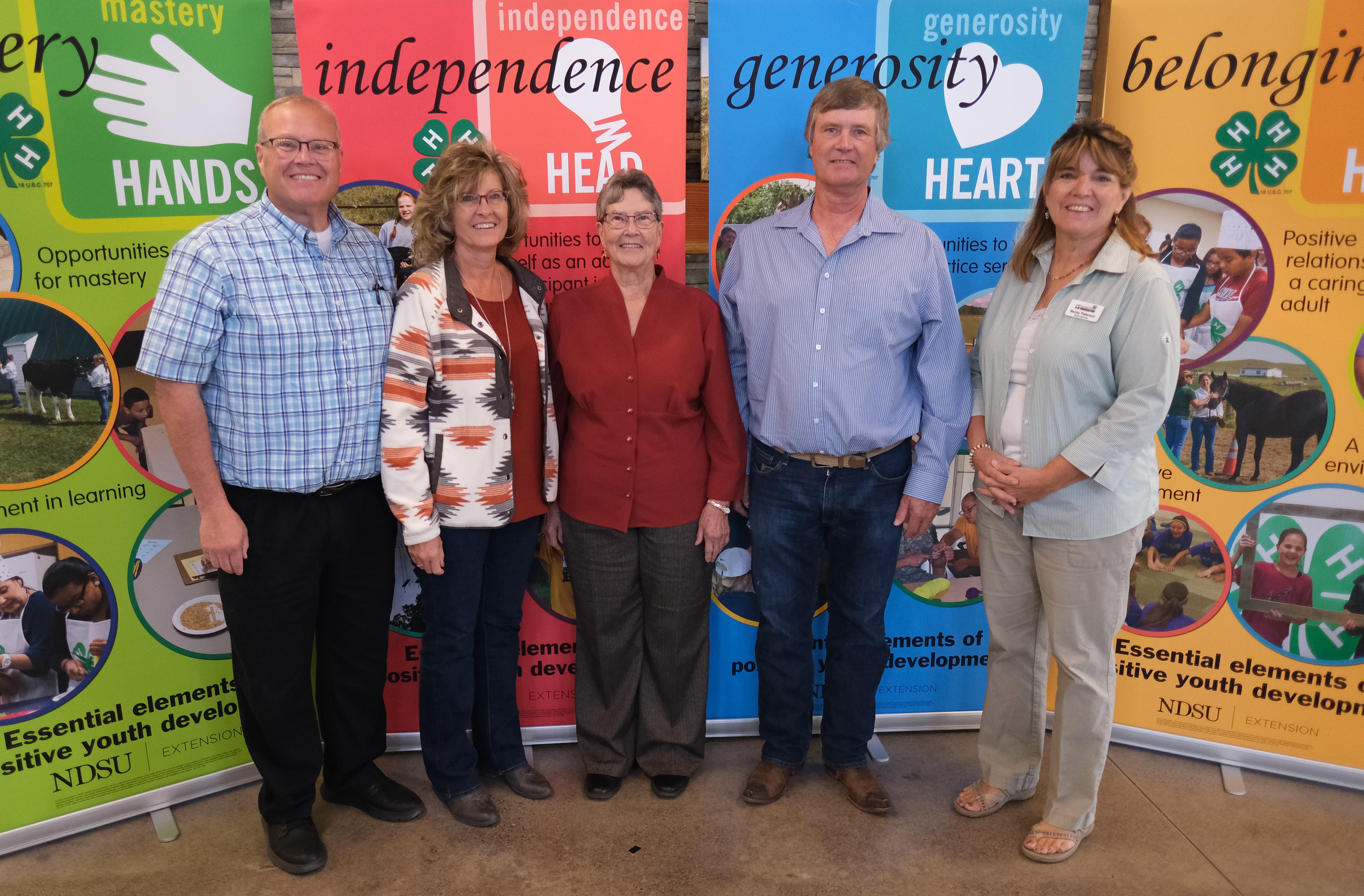 The Anderson family is recognized as a North Dakota 4-H Century Family. Pictured are (from left): Stacey Anderson, LaJuana Anderson Hayen, Karen Anderson, Wade Anderson and Becky Peterson, North Dakota 4-H Foundation chair. (NDSU photo)