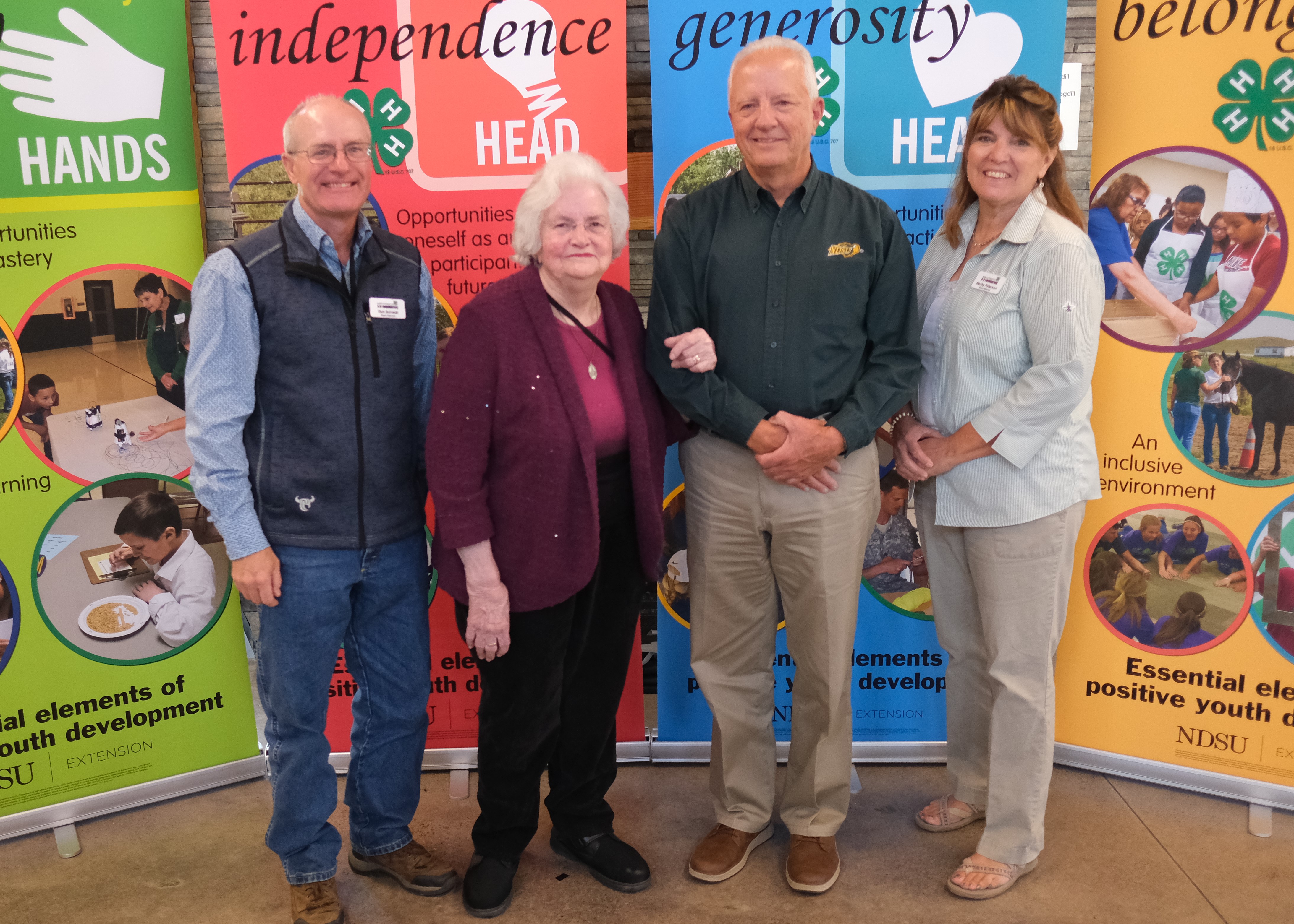 Duane Hauck is recognized as the 2024 Outstanding Lifetime Volunteer. Pictured are (from left): NDSU Extension agent Rick Schmidt, Millie Hauck, Duane Hauck, and North Dakota 4-H Foundation chair Becky Peterson. (NDSU photo)