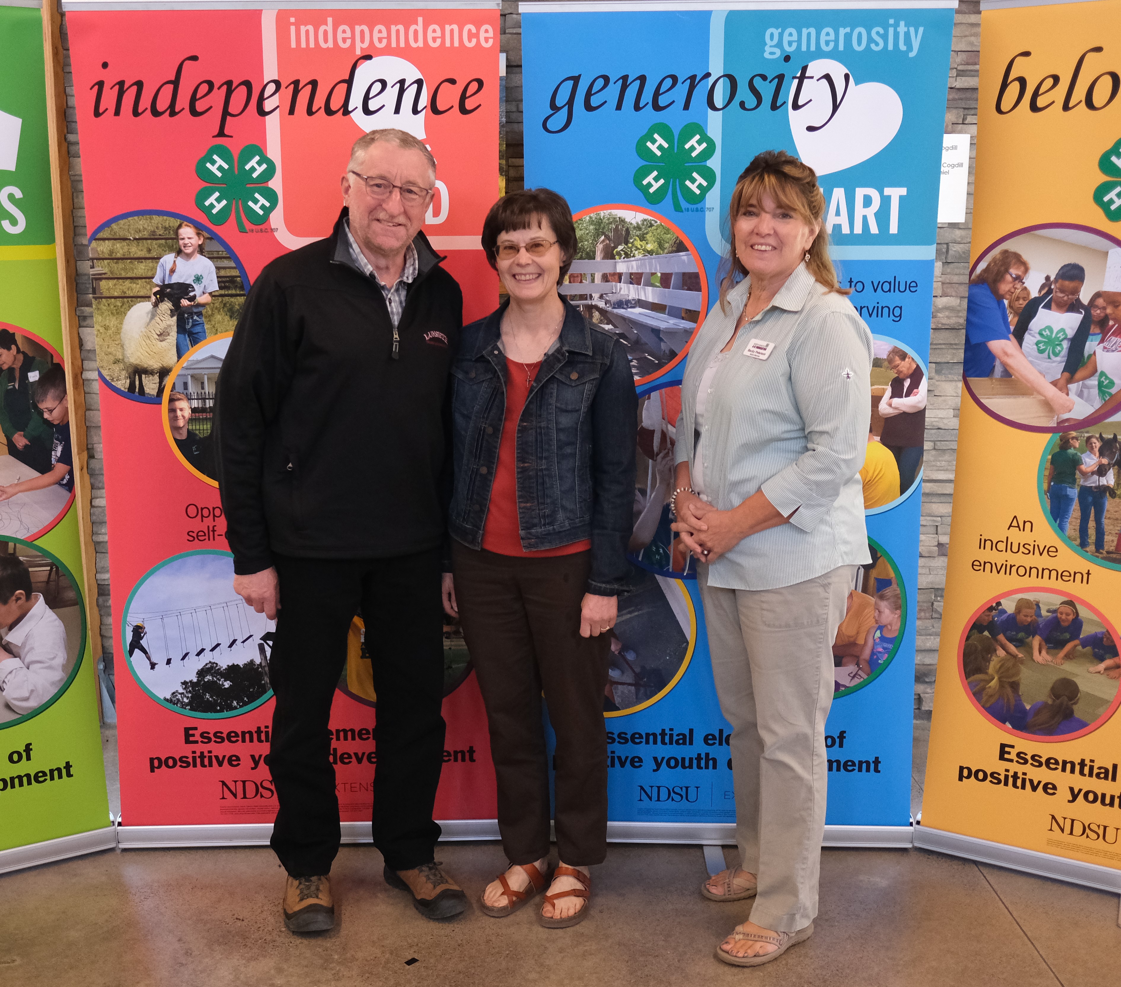 The Kraemer family is recognized as a North Dakota 4-H Century Family. Pictured are (from left): Phil Kraemer, Laurie Kraemer, and Becky Peterson, North Dakota 4-H Foundation chair. (NDSU photo)