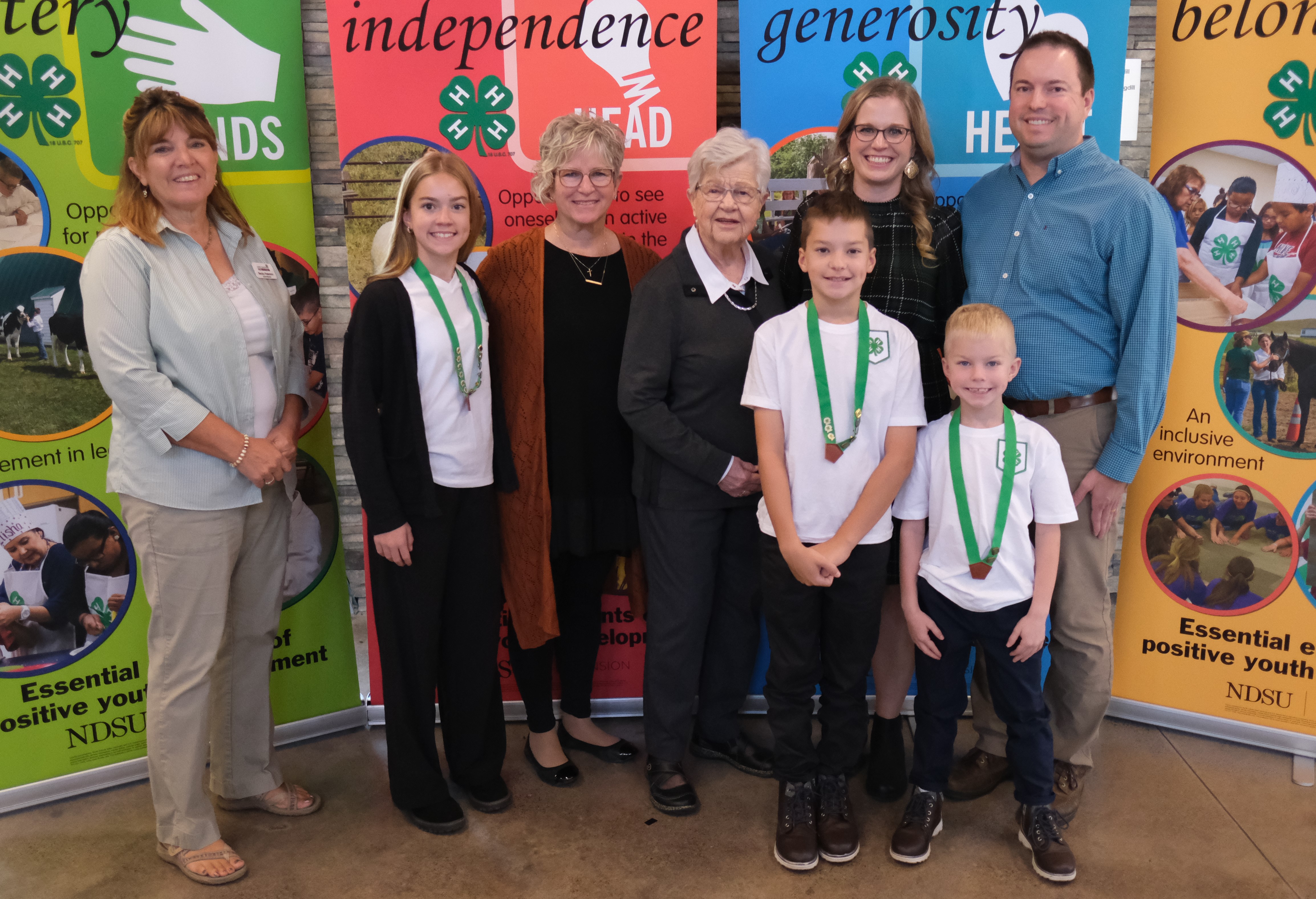 The Larsen family is recognized as a North Dakota 4-H Century Family. Pictured are (from left): North Dakota 4-H Foundation chair Becky Peterson, Mabel Loy, Kris Larsen, Joyce Larsen, Jalen Loy, Maari Loy, Toby Loy and Phillip Loy. (NDSU photo)