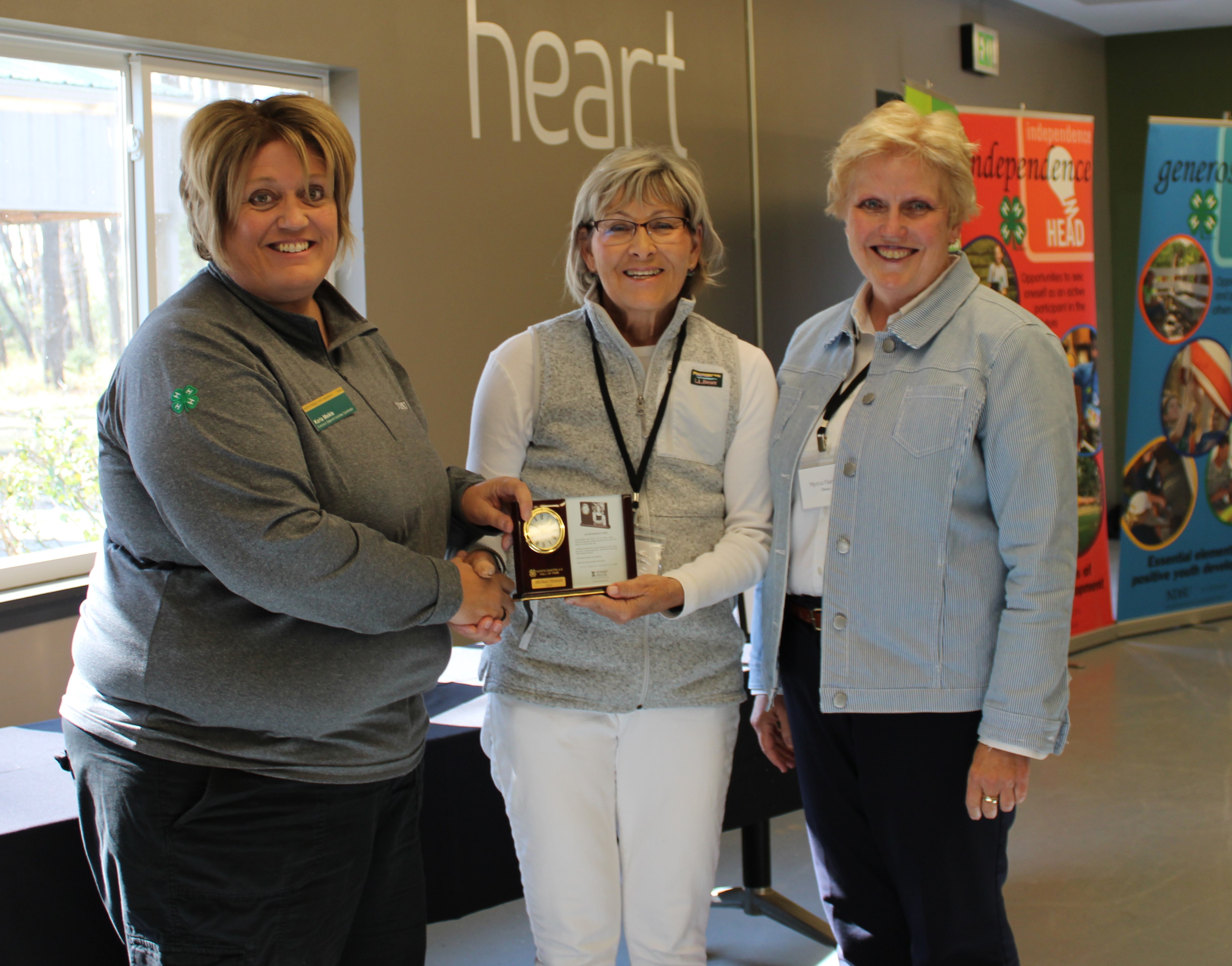 Mike Hanson was posthumously inducted into the North Dakota 4-H Hall of Fame. His wife, LuAnn Hanson, and sister, Myrna Hanson, accepted the award on his behalf. Pictured are, from left, state 4-H activities coordinator Karla Meikle, LuAnn Hanson and Myrna Hanson. (NDSU photo)
