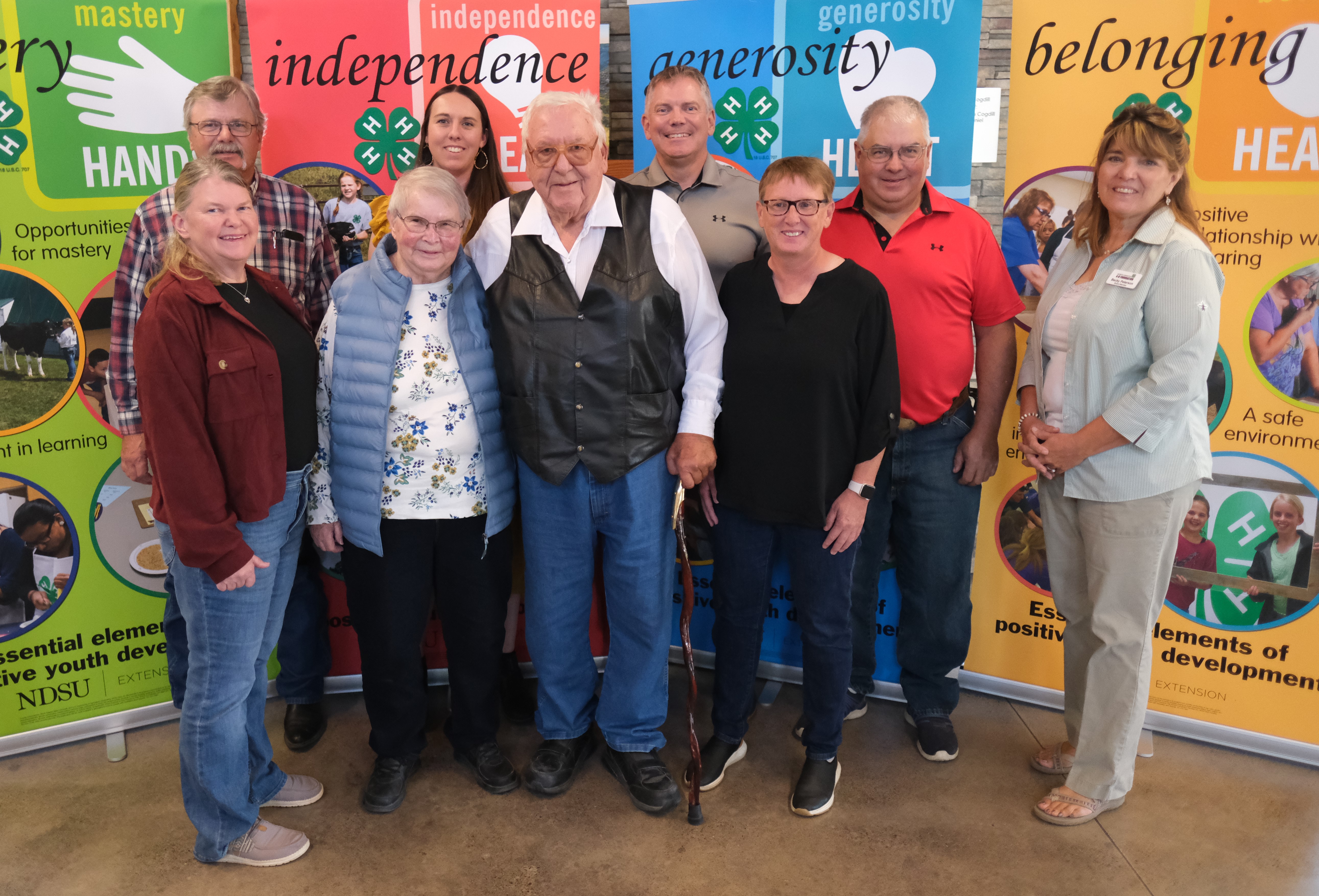 The Motter family is recognized as a North Dakota 4-H Century Family. Pictured are (from left): Jean Neset, Paul Motter, Carolyn Motter, NDSU Extension agent Emily Burkett, John Motter, Aaron Motter, Marlene Motter, Daniel Motter and Becky Peterson, North Dakota 4-H Foundation chair. (NDSU photo)
