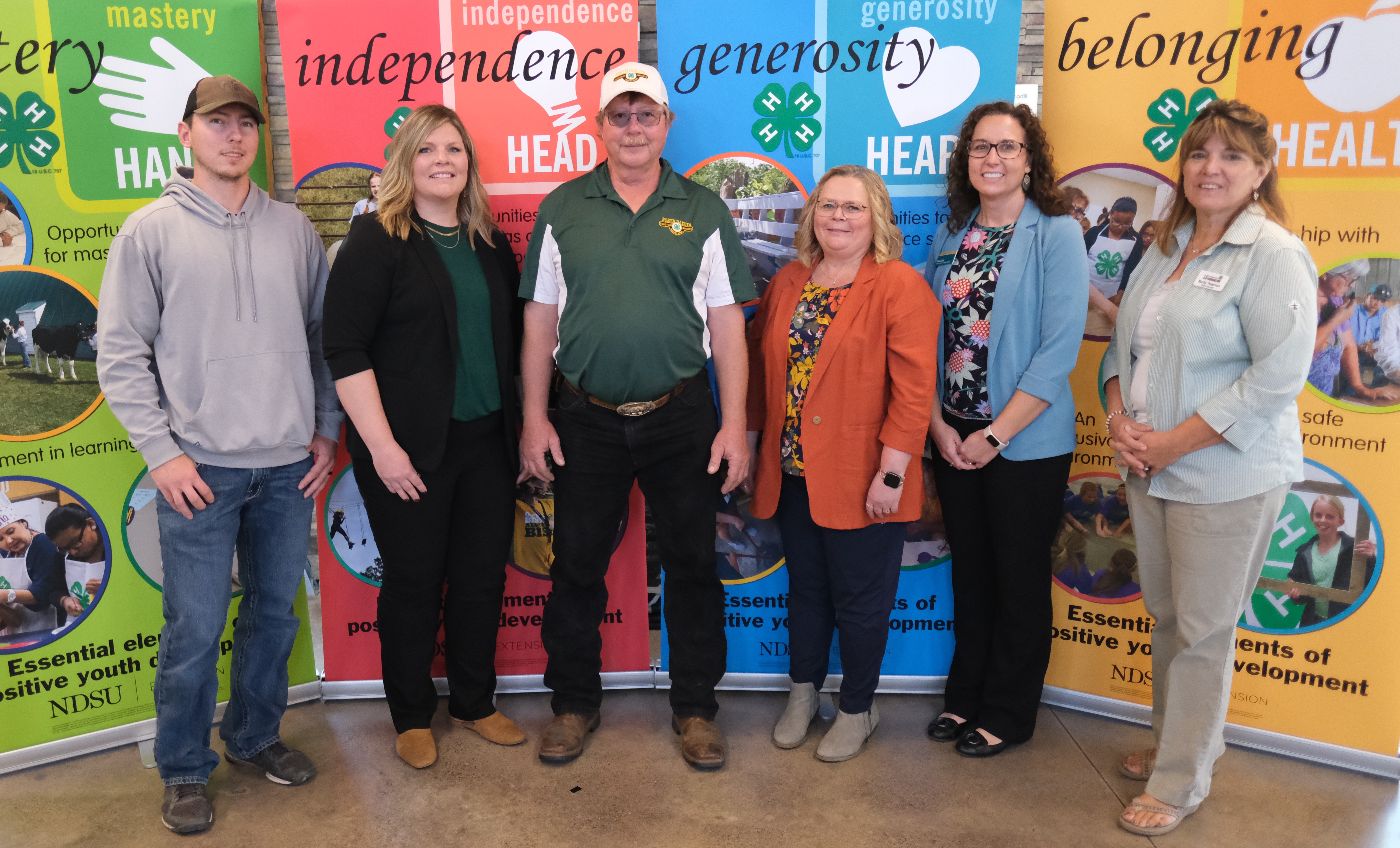 Norman Howard is recognized as the 2023 Outstanding Lifetime Volunteer. Pictured are (from left): Zach Howard; Trisha Berg, NDSU Extension administrative assistant; Norman Howard; Cindy Olson, NDSU Extension 4-H program assistant; Sara Laite, NDSU Extension agent; and Becky Peterson, North Dakota 4-H Foundation chair. (NDSU photo)