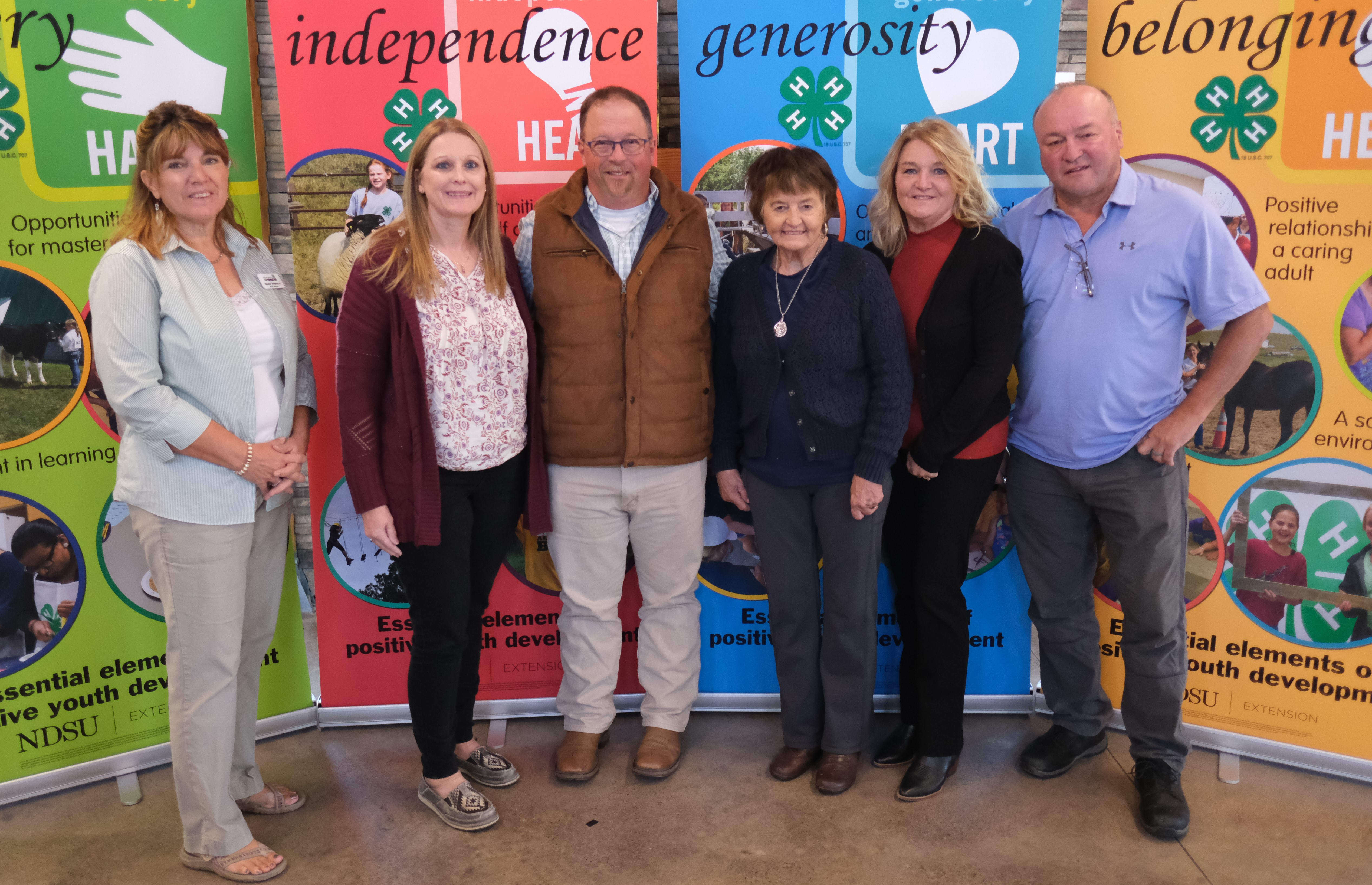 Travis Anliker is recognized as the 2023 Volunteer of the Year. Pictured are (from left): North Dakota 4-H Foundation chair Becky Peterson, Amy Anliker, Travis Anliker, Phyllis Anliker, Ann Anliker and Todd Anliker. (NDSU photo)