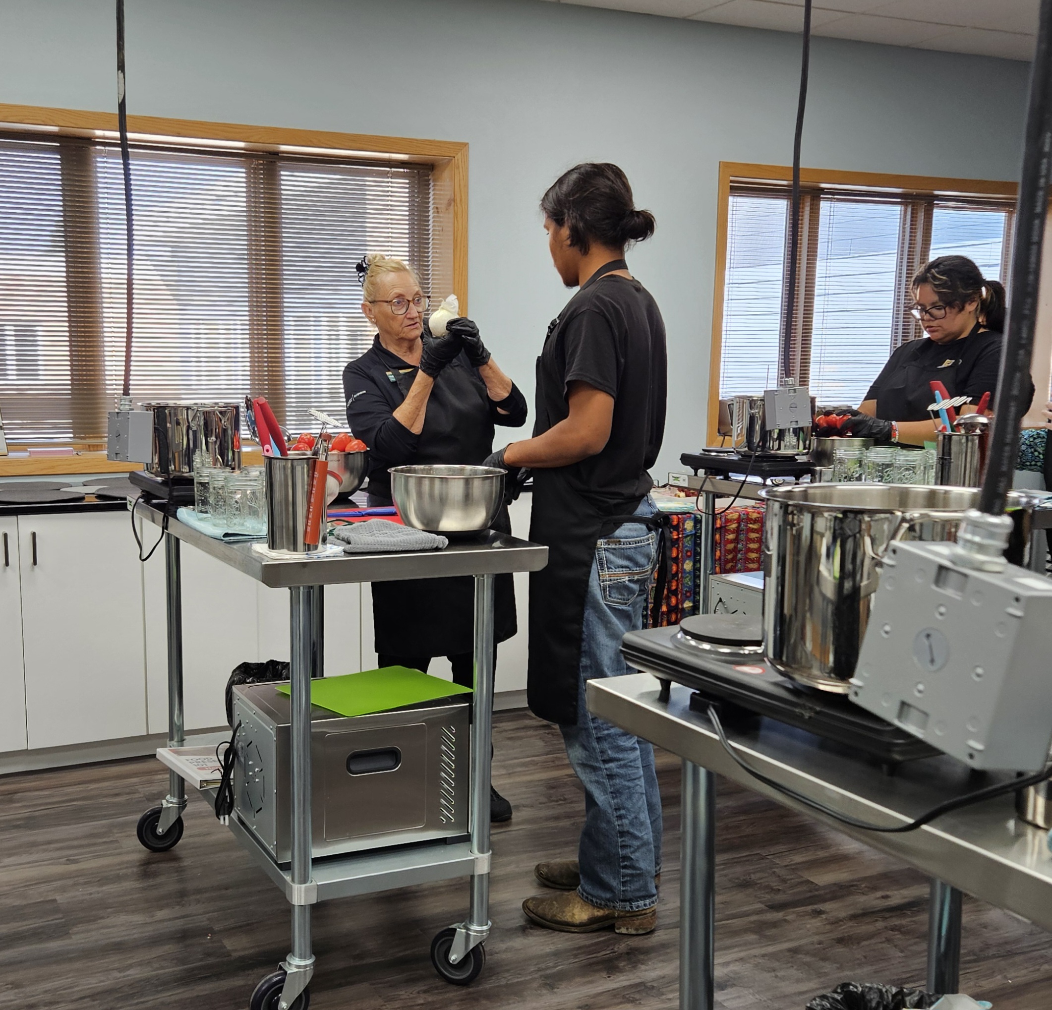 NDSU Extension agent Gabriele Nelson teaches students about food preservation at Candeska Cikana Community College. (NDSU photo)