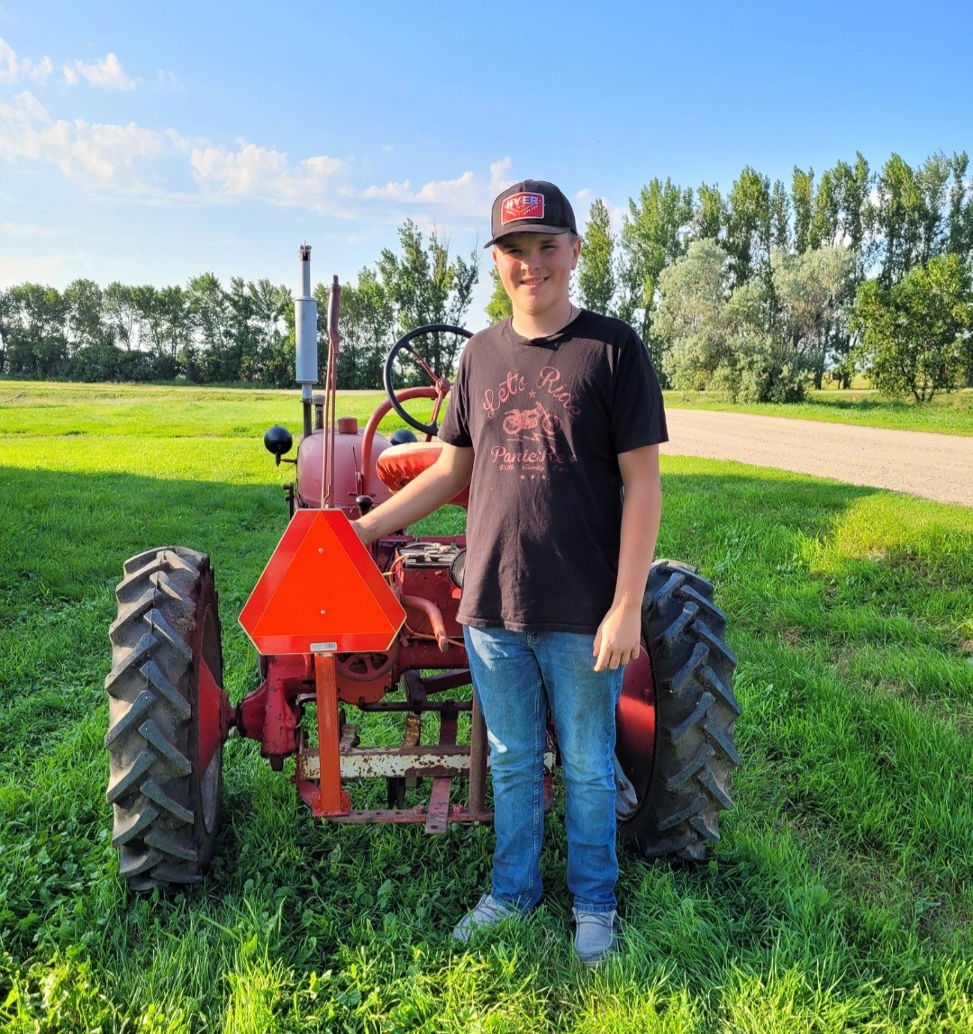 Aaron Ward of Custer County, Montana, placed second for building a new sign holder and properly installing a slow-moving vehicle sign on an International Cub tractor. (Submitted photo)
