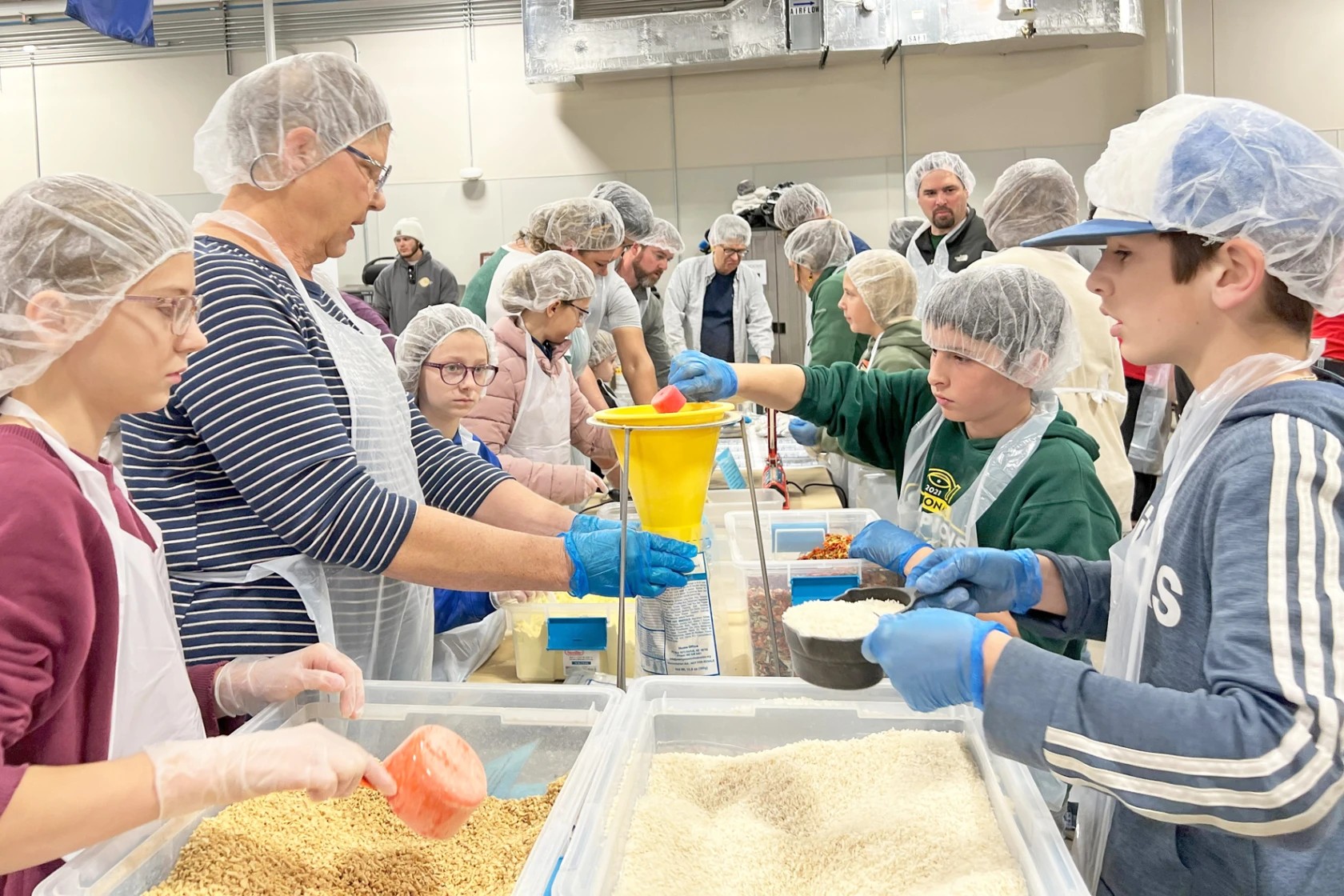 Members from the Country Kids 4-H Club in Stutsman County packaged food for the Kids Against Hunger Organization as a community service project for the Healthy North Dakota 4-H Club challenge.
